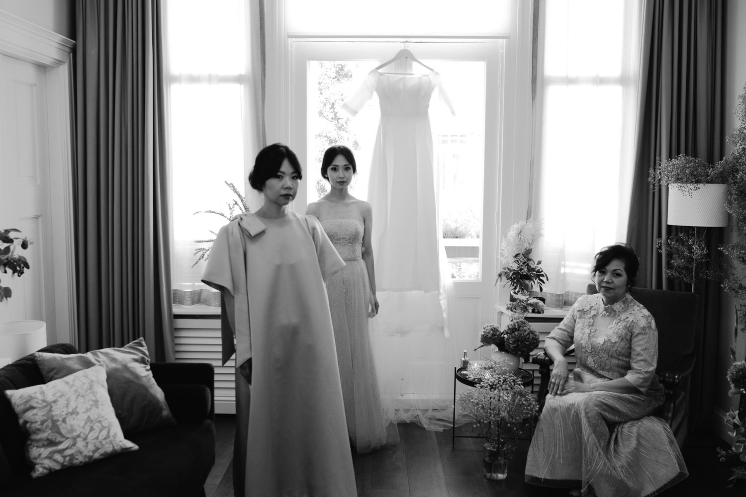  bride getting ready for wedding black and white portrait 