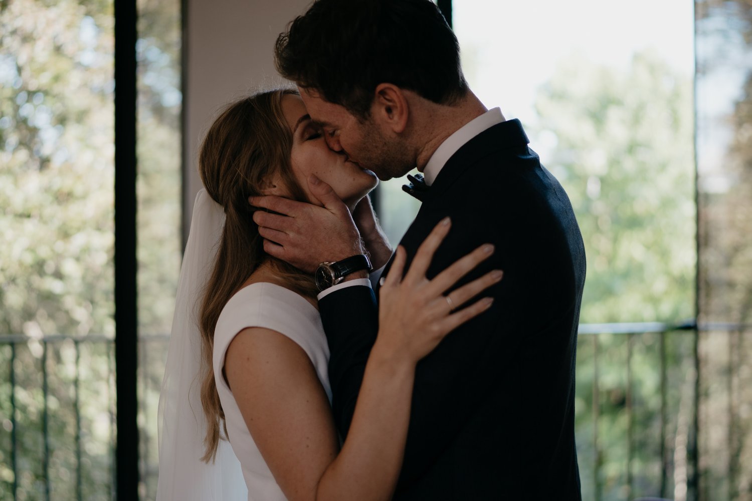 lovely first kiss during wedding ceremony photograph by wedding photographer mark hadden 