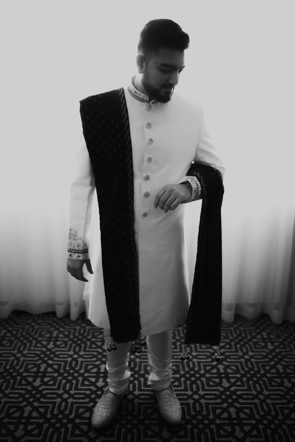 groom prep portrait in tanzania by mark hadden wedding photographer