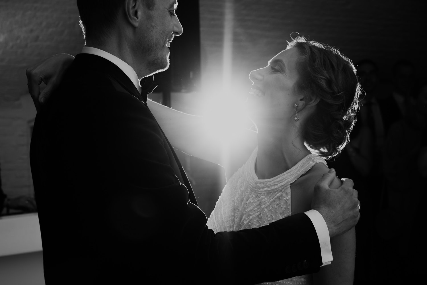 couple photograped wedding party flash photography